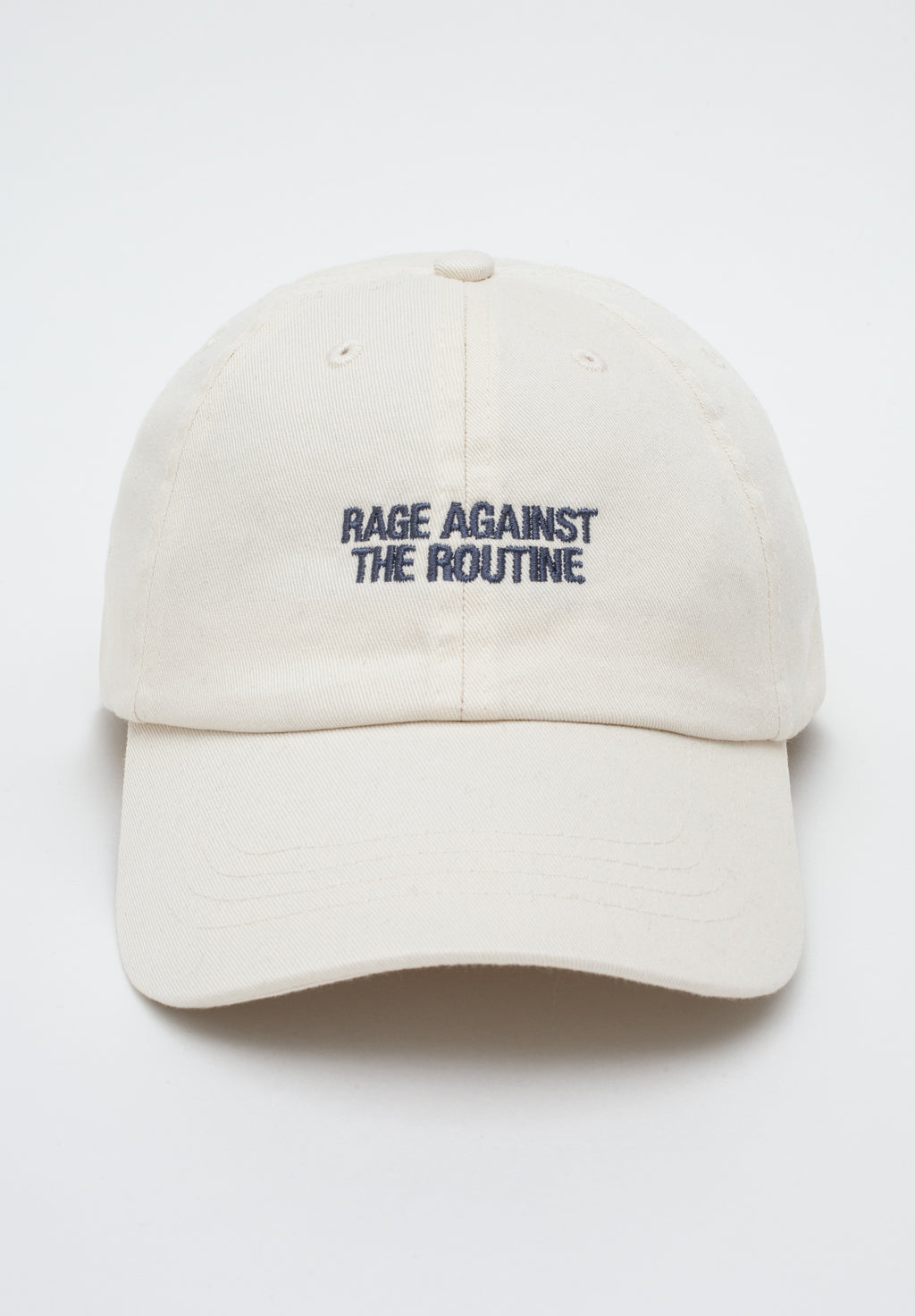 iumi Rage Against The Routine Cap White – Frontansicht Flatlay, Stickerei in Grey
